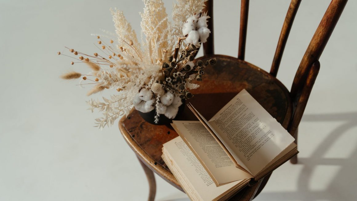 white book page on brown wooden table
